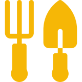 Yellow garden fork and trowel on a white background